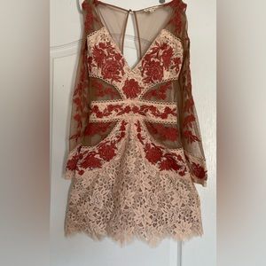 The brand is for Love and Lemons 🍋. It’s a unique and pretty dress.